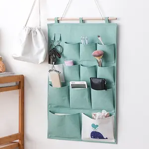 Kreatives Zuhause schöne Baumwolle Leinen Stoff Hänge tasche Lagerung liefert große Kapazität Schlafsaal Tür Wandbehang Tasche