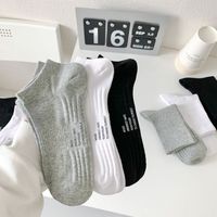Vente en gros de chaussettes personnalisées Chaussettes de sport blanches pour hommes Chaussettes unisexes en coton avec logo personnalisé