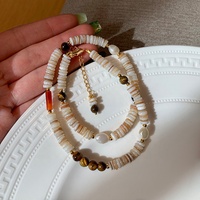 2024 nouveau naturel Beige coquille perlée ronde oeil de tigre pierre perle d'eau douce collier filles bijoux personnalisés