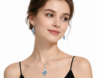 Parures de bijoux uniques en acier inoxydable, cristal de mode, plaqué argent bleu, motif lotus, pour femmes, vente en gros