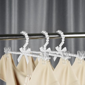 Cintres pour pantalons en perles <span class=keywords><strong>Porte</strong></span>-vêtements en plastique avec nœud papillon avec organisateur à clips pour ranger les robes Chemises Pantalons Jupes dans le placard des chambres à coucher - Product Image 4