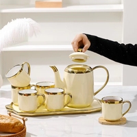 Ensemble de tasses à thé de luxe en 6 pièces avec théière et plateau, ensemble de tasses à thé et à café en céramique avec poignée et bordure dorés