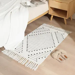 Venta caliente decoración interior moderna tejida aceptar lavable Simple sala de estar alfombras y alfombras con borla