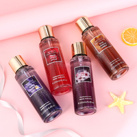 Brume parfumée pour femme, cylindrique, dégradé violet, capuchon doré, étiquette florale, boîte de présentation étoile de mer, fruitée, longue durée