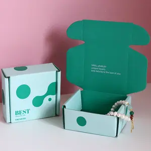 Emballage en carton ondulé rose de conception gratuite, petites boîtes cadeaux avec logo pour bijoux/boîte postale imprimée de couleur