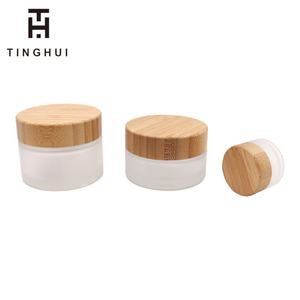 Custom Print logo 50g 100g 50ml 100ml Cosmetic Lotion Jar Frosted <b>Glass</b> Jars with Bamboo Wooden Lids - Product Image 2
