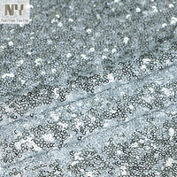 Tissu en paillettes argentées brillantes de 3 mm en PET de Nanyee Textile avec support en maille extensible 4 directions en nylon