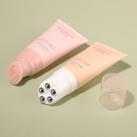 Tube vide rose mat personnalisé de 50 ml, emballage écologique avec double bille roulante pour massage, tube souple pour lotion corporelle