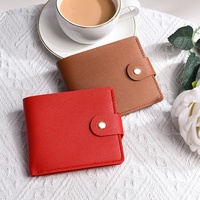 Dompet PVC Portabel Terlaris Lintas Batas Warna Hitam Unisex Model Pendek 2026 Model Baru Desain Kancing Jepret Horizontal Ultra-tipis