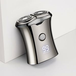 Afeitadora rotativa en seco y húmedo, Mini afeitadora de viaje eléctrica para hombres, maquinilla de <span class=keywords><strong>afeitar</strong></span> electrónica lavable de tamaño de bolsillo - Product Image 1