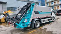 Nouveau véhicule sanitaire à énergie nouvelle 10 m³ électrique 4x2 automatique à chargement arrière, compacteur de déchets, camion de collecte des ordures