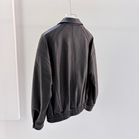 Veste en cuir de moto pour femme en peau de mouton texturée douce, coupe oversize, avec plusieurs revers et grandes poches, pour un confort quotidien