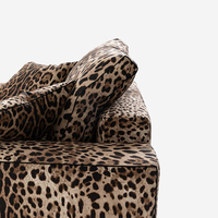 Fauteuil de salon design minimaliste fait main avec imprimé léopard, structure en bois massif et mousse haute résilience pour chambre à coucher et salon