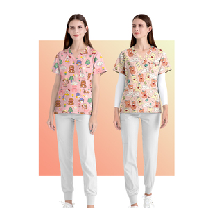 2024 Trendsetting Ankara Women's Scrubs-Mezcla de algodón transpirable y poliéster resistente para profesionales médicos - Product Image 1