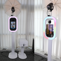 Machine de photomaton de mariage iPad ovale à succès avec coque de photomaton DSLR, éclairage LED RGB et flight case pour la location