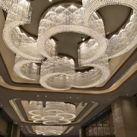 Lustre circulaire combiné en cristal, luminaire suspendu LED personnalisé pour hall d'hôtel, salle de banquet, éclairage de plafond pour projets d'ingénierie