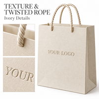 Sac en papier ivoire de qualité supérieure avec logo personnalisé, sac d'emballage pour bijoux en papier texturé, sac de boutique avec poignée en corde torsadée
