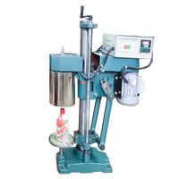 Machine manuelle de rétrécissement de bouteilles de vin d'huile d'olive en verre semi-automatique de capsule de pvc