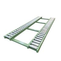 Système de convoyeur à rouleaux par gravité en acier au carbone robuste avec une vitesse de 20 m/min, garantie 1 an pour les fabricants de logistique d'entrepôt