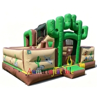 Château gonflable commercial à thème western avec toboggan, idéal pour les fêtes d'enfants et la location