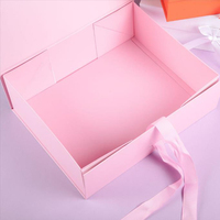 Boîte cadeau de luxe pliable rose en gros personnalisée avec fermeture magnétique et ruban