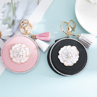 Porte-clés créatif en cuir, miroir de maquillage portable, mini miroir rond, petite fleur, miroir de poche personnalisé, outil de beauté cosmétique, cadeau
