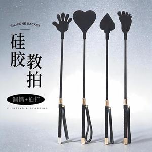 Juguete de silicona con forma de corazón negro para estimulación de manos y pies en adultos, para coquetear y dar palmadas. - Product Image 1