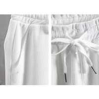Ensemble deux pièces pour homme grande taille, personnalisé, en coton gaufré, comprenant un t-shirt à col ras du cou et manches courtes et un short, couleur unie, vente en gros