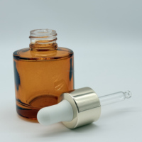 30ml Runde Glas-Tropfflasche mit Flacher Schulter, Silbernem Verschluss, Bernsteinfarben oder Transparent, mit Individuellem Logo-Siebdruck