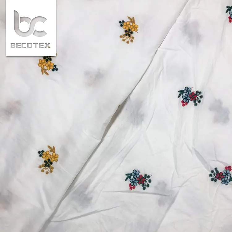 Hochwertige bedruckte, weiß gewebte Blumen stickerei auf Baumwolle Ösen spitzens toff für Kleid