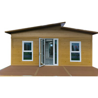 Maison conteneur portable moderne à double aile extensible avec revêtement en bois, préfabriquée, avec cuisine, salle de bain et salon