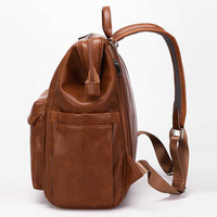 Sac à couches en cuir véritable personnalisé sac à dos pour femmes maman et bébé station à langer caractéristique