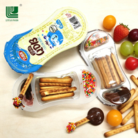 Approvisionnement direct usine OEM Vente en gros Personnalisé Biscuit en bâtonnet crémeux au chocolat 3-en-1 Multicolore Mini Bonbons en forme de haricot