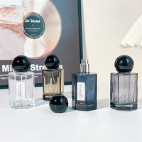 Flacon de parfum élégant de 50 ml, noir encre, vide, vaporisateur portable avec bouchon en résine pour emballage cosmétique