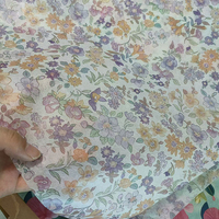 Vente en gros papier de soie imprimé personnalisé à motif de feuille verte papier d'emballage cadeau de marque pour l'emballage de fleurs de vêtement