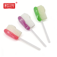 Sucette brosse à dents fantaisie avec sauce à tremper et bonbons pétillants, un plaisir pour les fêtes d'enfants aux couleurs vives