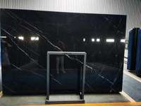 Marbre noir Nero Marquina de Chine de haute qualité avec des veines blanches le carrelage en marbre noir le moins cher carrelage escalier