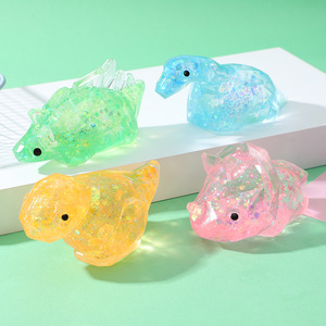 New Design Multi Design Colorful Maltose Glitter Dinosaur Sensory Stress Fidget Toys <b>Squishy</b> Stress Ball Capsule Toy - Product Image 1