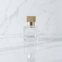 Flacons de parfum carrés de luxe 100 ml en verre avec bouchon en verre à motif en relief, emballage vide en gros pour vaporisateur, surface sérigraphiable