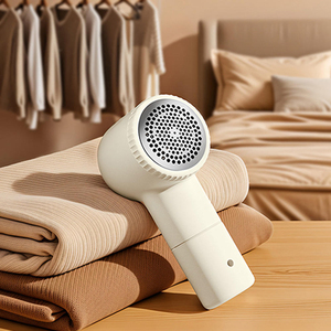 Éliminateur de bouloches électrique portable avec lame en acier inoxydable, rasoir automatique pour pulls, tondeuse USB pour vêtements à la maison et en voyage - Product Image 1