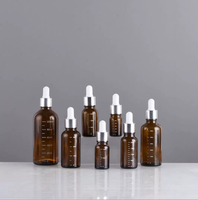 Flacon compte-gouttes en verre ambré gradué avec pipette en caoutchouc marron, flacon vide avec échelle graduée pour sérum et huiles essentielles