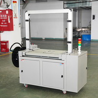 Machine à cerclage électrique entièrement automatique KZ-102A pour boîtes en carton, ruban PP, boîtes de plusieurs tailles, ligne d'emballage, table à rouleaux