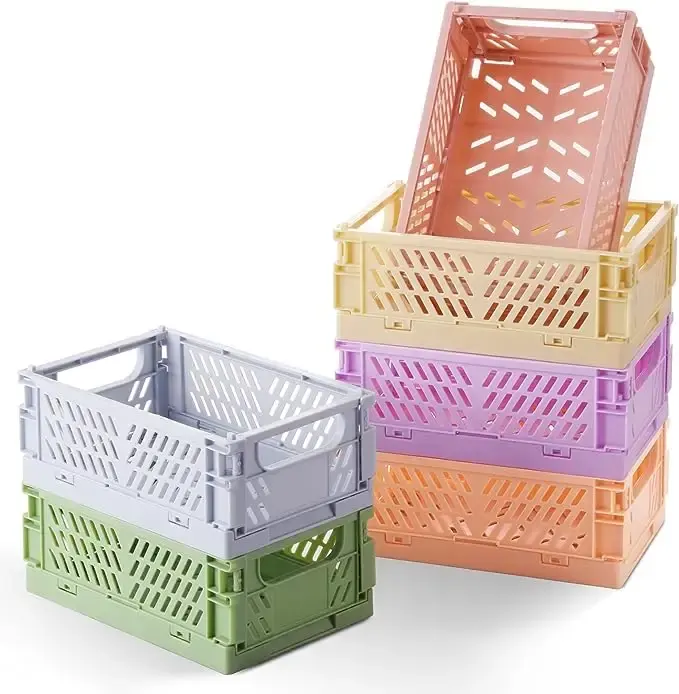 Boîtes de rangement pliantes empilables organisant des caisses pastel en plastique avec poignées pour la maison et le bureau