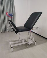 Xinman 2 Réglage de la hauteur du moteur Lit de beauté électrique Lit de traitement Lit de massage Conception de contrôle des pieds