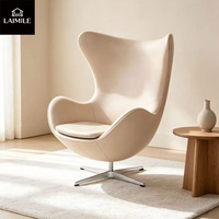 Fauteuil de loisirs haut de gamme de style nordique, revêtement en cuir véritable, pivotant, pour la maison, la réception ou les espaces commerciaux