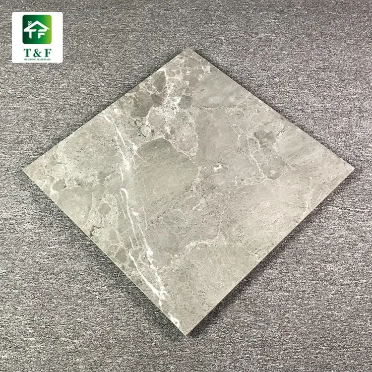 食堂の床タイルを購入する中国からの磁器タイルの磨かれた艶をかけられた灰色の大理石の外観の輸入業者