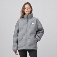 Veste d'hiver unisexe en duvet de canard 90 %, coupe oversize, à capuche, pour femme, idéale pour les températures extrêmes et les conditions enneigées.