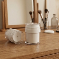 Pot à pompe sous vide en plastique, double paroi, isolant efficacement l'air et prévenant l'oxydation, pour le stockage de lotions et produits de soin.