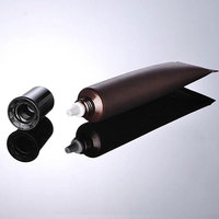 Contenant personnalisé en gros marron 20g souple à presser pour crème cosmétique contour des yeux PETG/PVC/PC EC-004 avec bouchon à vis sérigraphié Marque Tf