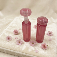 Tube de brillant à lèvres transparent rose effet cristal, tube de gloss en forme d'apsule, contenant de sérum pour les lèvres